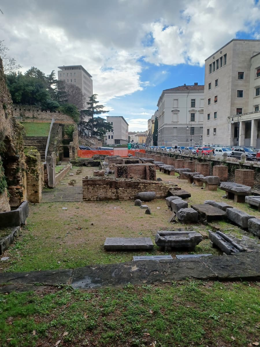 the ruins of a roman theatre on a city street in trieste italy