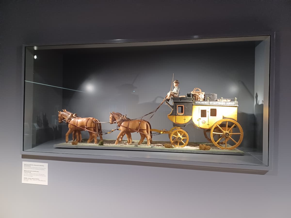 a model horse and carriage on display at lichtenstein post museum in vaduz