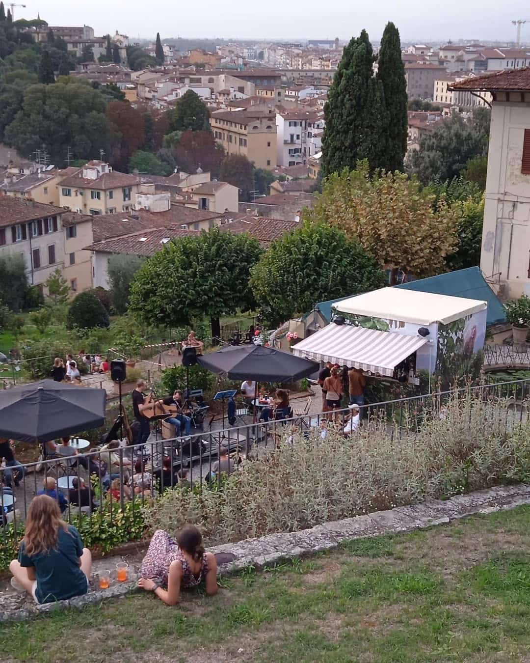 Music and cafe selling aperitifs and light bites in the rose garden