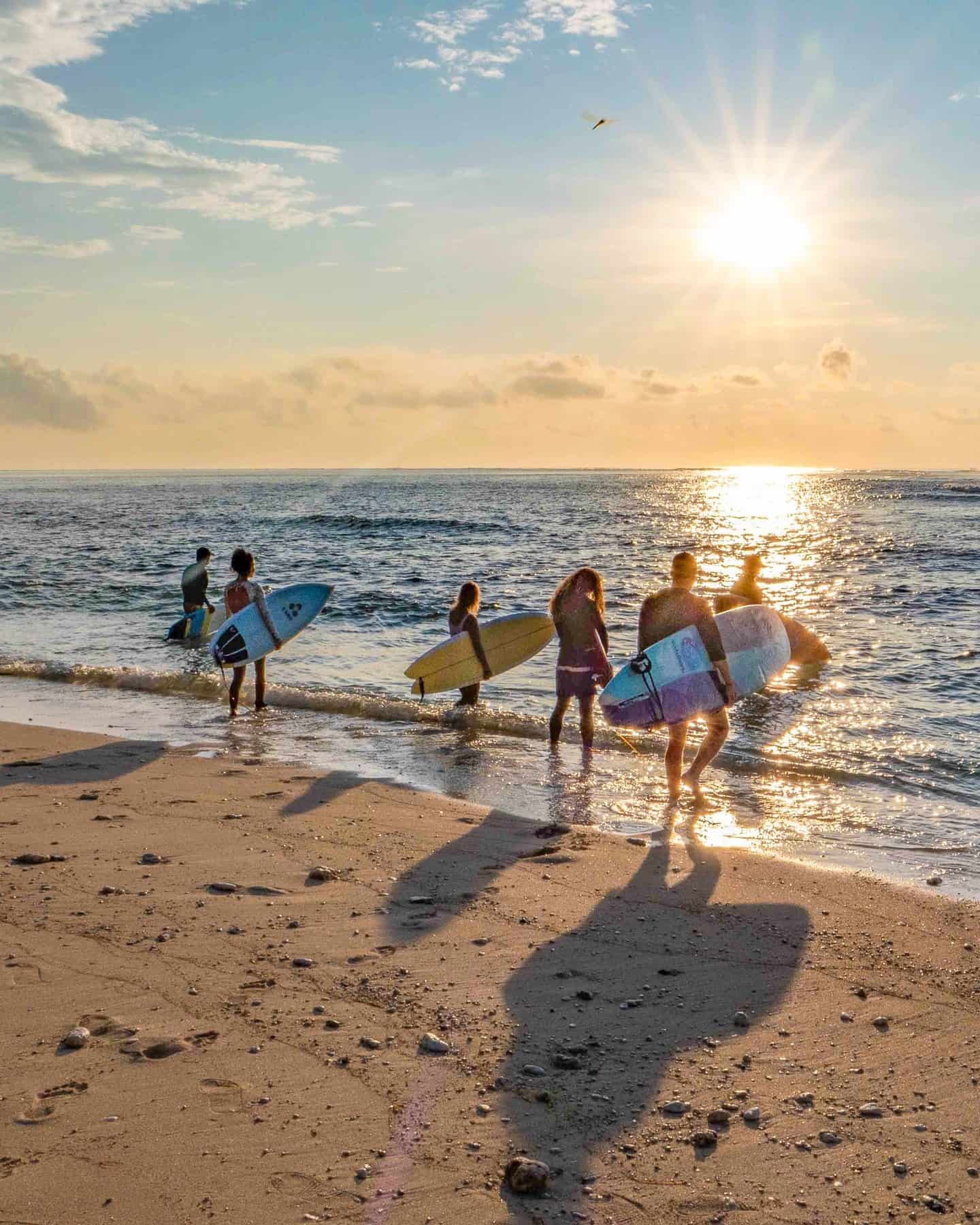 Go surfing in Bali, surfers at Green Bowl Beach