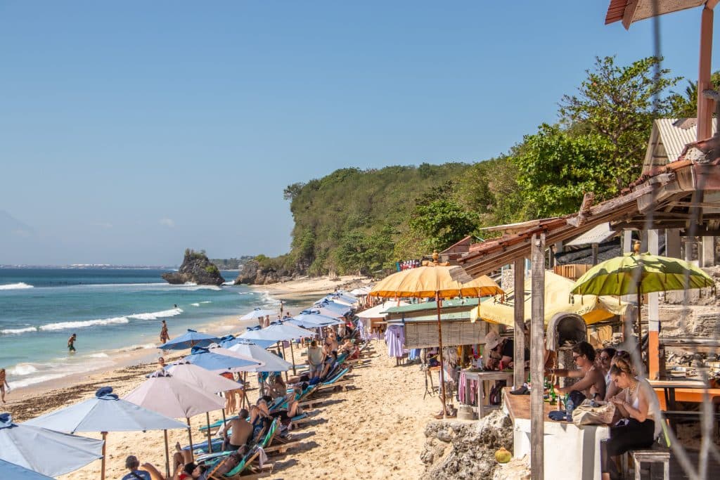 Eateries and loungers along Thomas Beach in Uluwatu