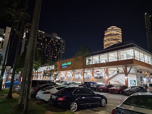 Exterior of Golden Mile Food Centre at night