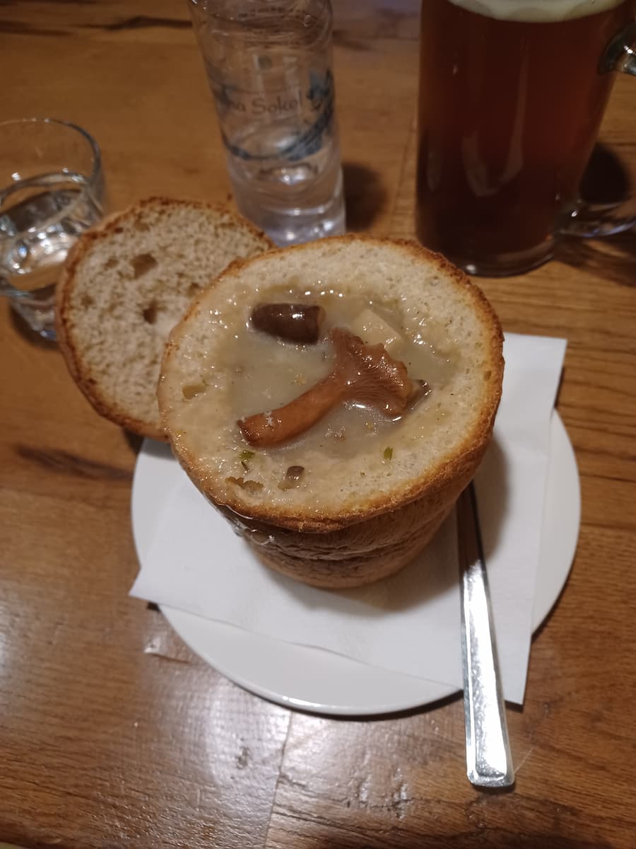 gobova juha soup is one of the most traditional slovenian foods served in a brown bread bowl at gostilna sokol restaurant in ljubljana slovenia
