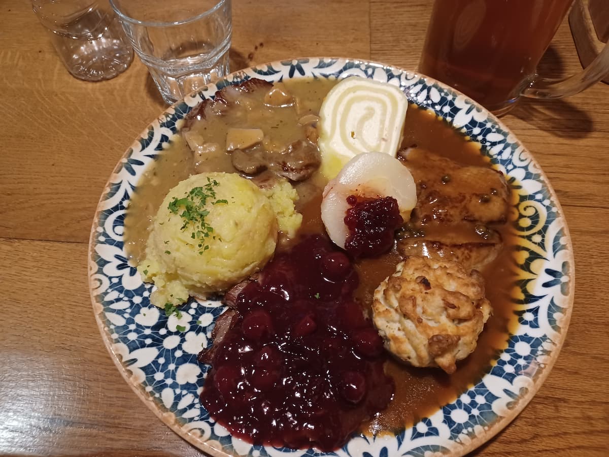 a plate of game meat served at gostilna sokol one of the best restaurants in ljubljana slovenia