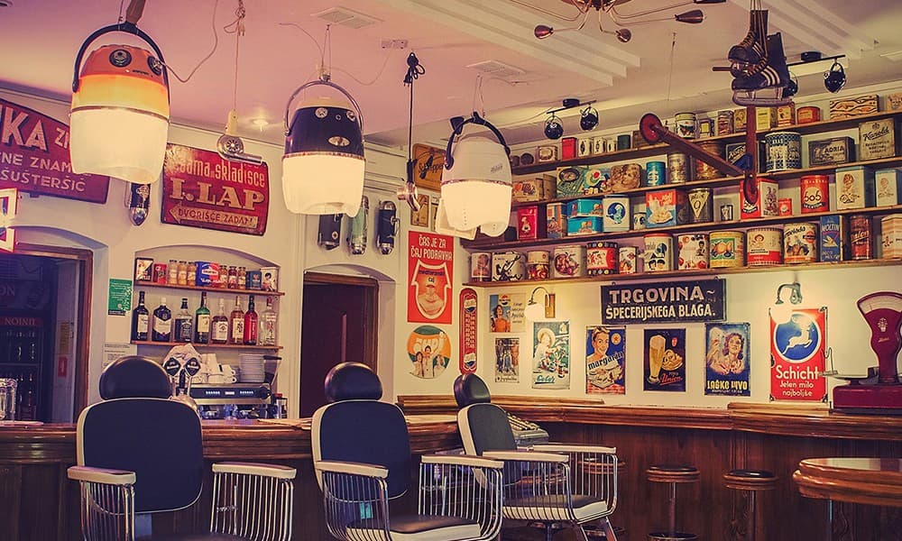 retro bar stalls and signage at nostalgija cafe in ljubljana slovenia