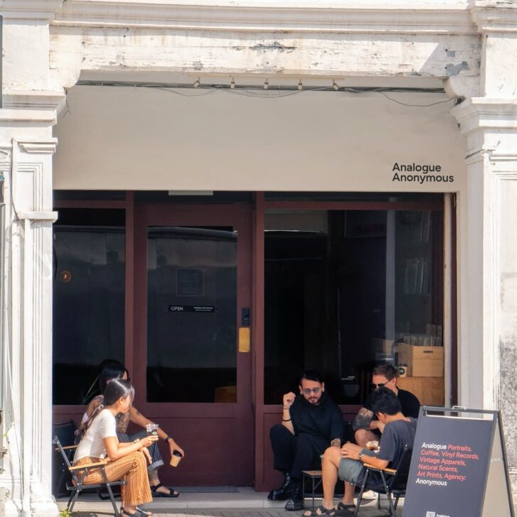 Patrons gatehring outside the coffee shop-meets record store