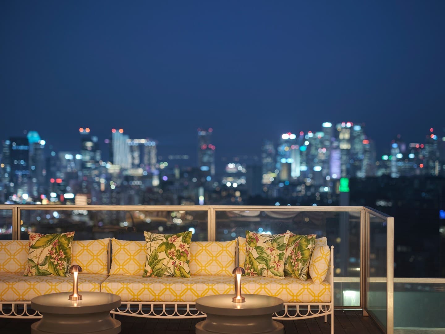 Outside chill area around the rooftop pool