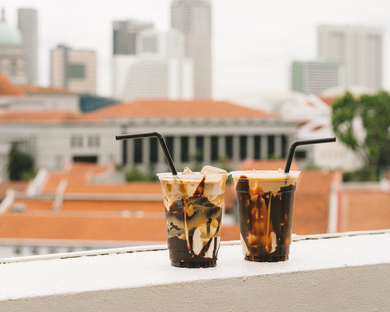 Iced coffees with chocolate on the balcony outside