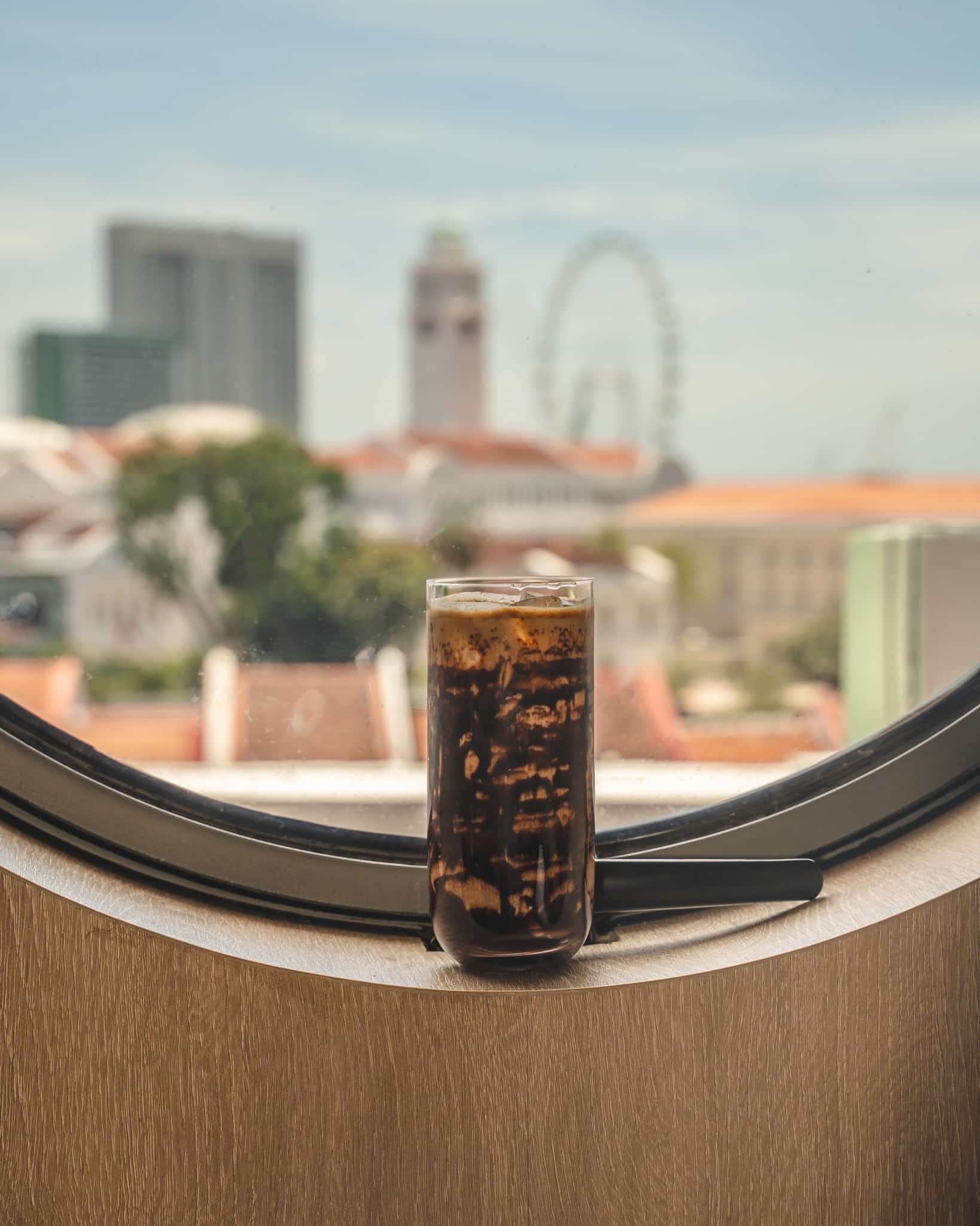 Iced coffee and porthole view
