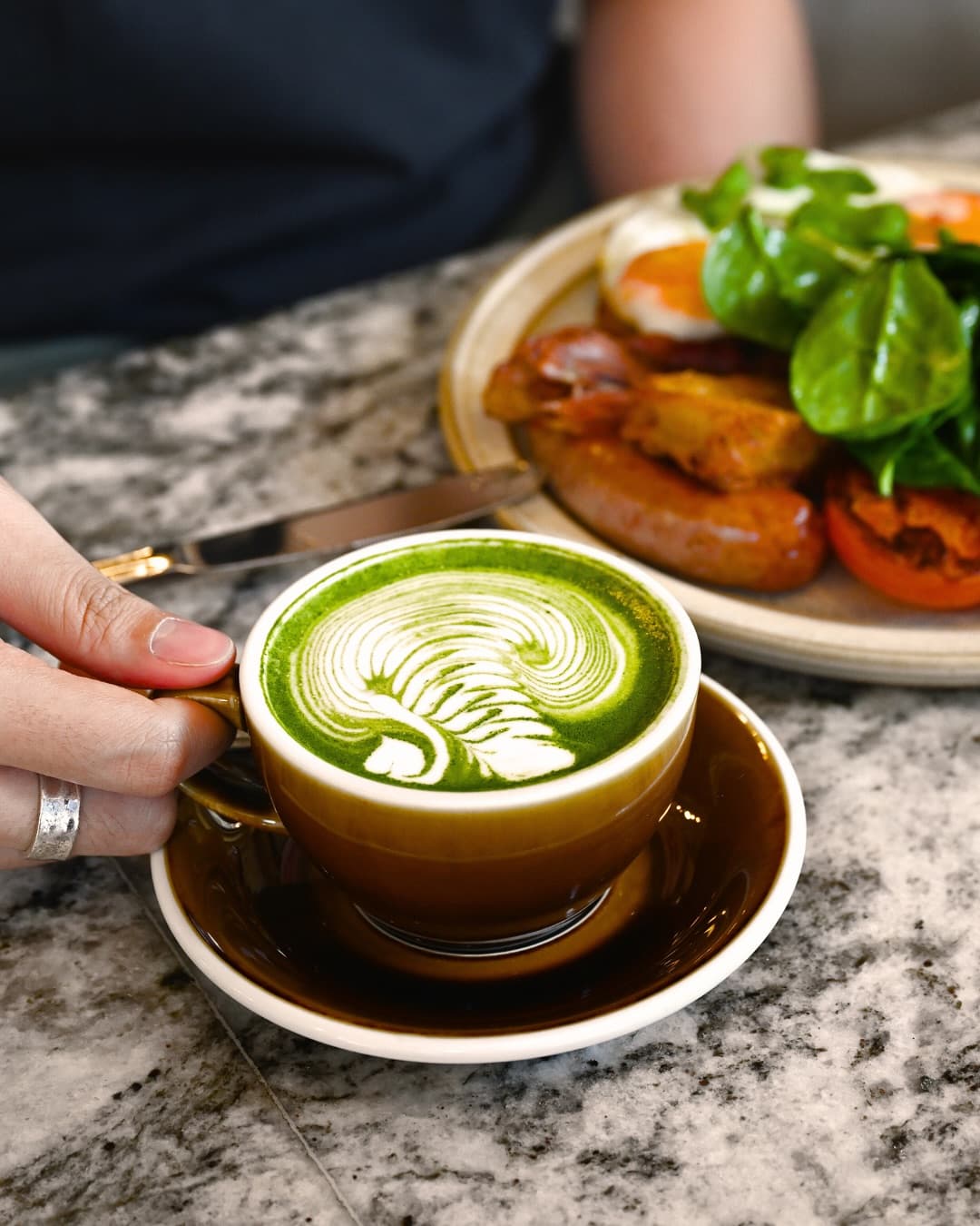 Matcha with latte art and breakfast